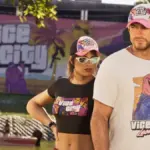 Jason and Lucia wearing GTA Vice City Leonida merch